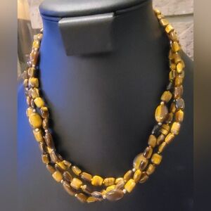 Triple strand of stunning tigers' eye stone Necklace measuring 19 inches